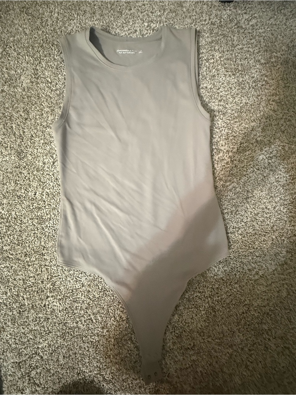 Sleeveless women’s One-Piece Bodysuit in nude